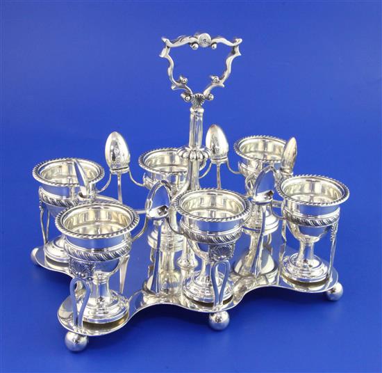 An Edwardian silver egg cruet, 31 oz.